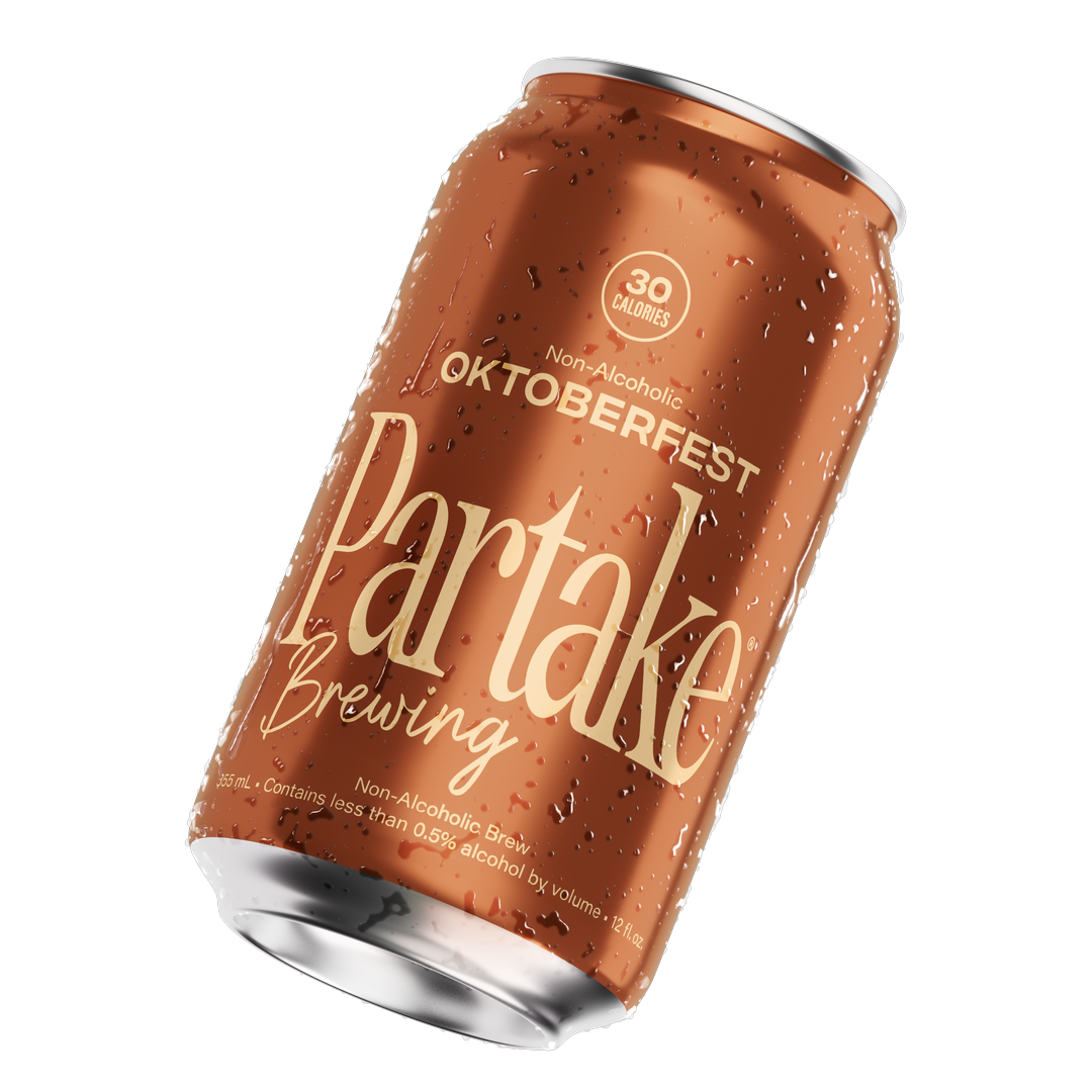Partake Oktoberfest non-alcoholic beer can, tilted with condensation