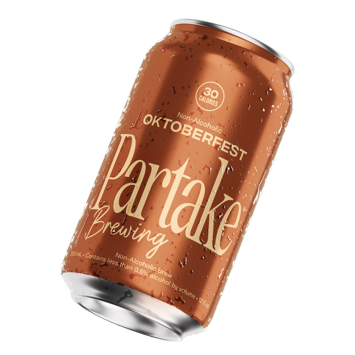 Partake Oktoberfest non-alcoholic beer can, tilted with condensation